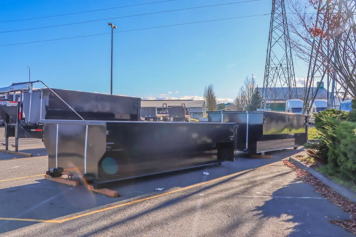 Roll-off dumpster ready for waste disposal at job site for 2 Yard Dumpster Rental in Martin